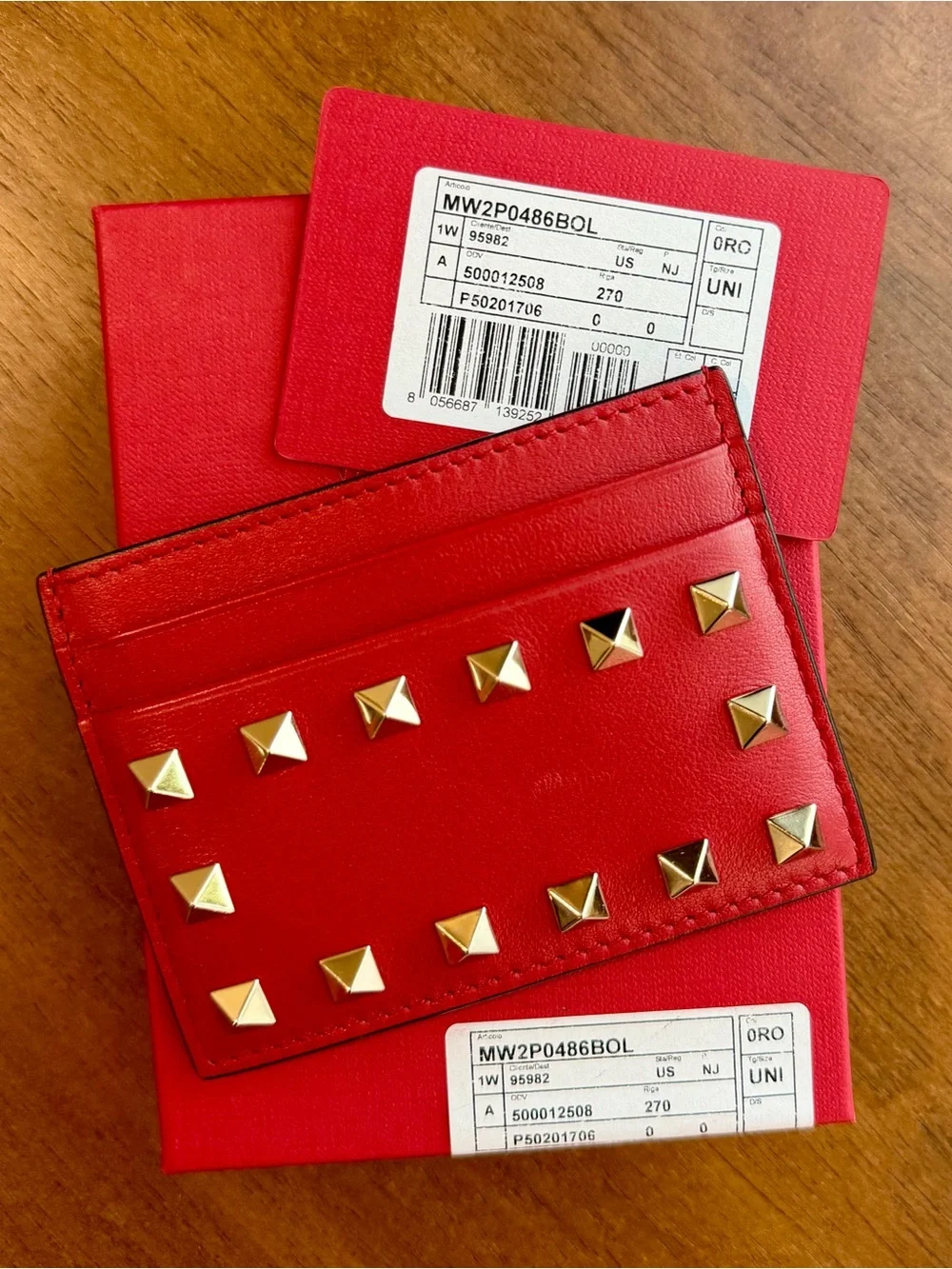 Valentino Garavani gently used